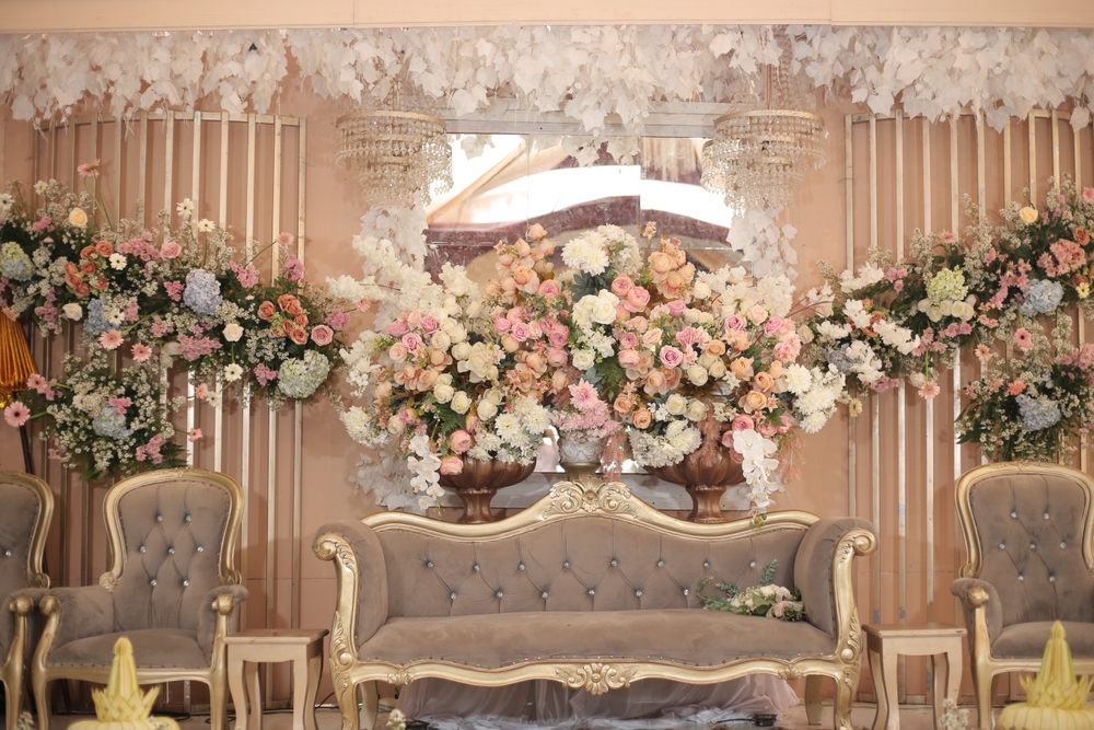 A,Beautifully,Decorated,Wedding,Stage,Featuring,A,Luxurious,Sofa,And